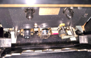 A cassette deck transport